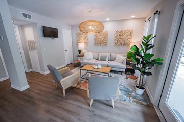 Wilmington apartment for rent - a living room with couches and chairs and a table