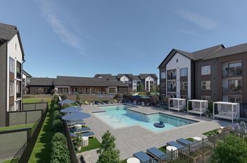 Kannapolis apartment for rent - A large outdoor swimming pool surrounded by lounge chairs and umbrellas.