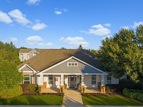 Mcdonough apartment for rent - the front of a house with a driveway and trees