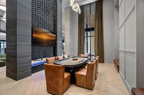 Greensboro apartment for rent - A modern dining room with a large table and chairs.