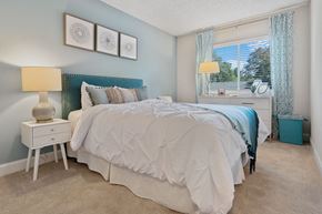 Asheville apartment for rent - a bedroom with a bed and a window