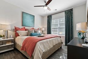 Mooresville apartment for rent - Spacious Bedroom with Large Windows and Ceiling Fan