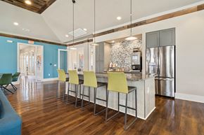 Weaverville apartment for rent - a kitchen with a large island with bar stools