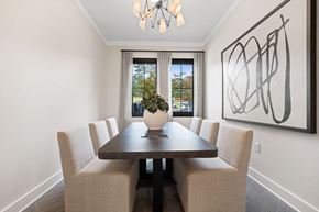 Pinehurst apartment for rent - a dining room with a table and chairs