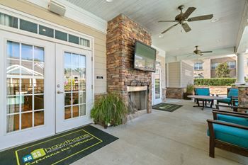 Poolside veranda and outdoor fireplace