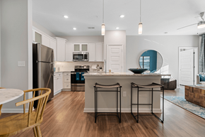 Denver apartment for rent - Designer Tile Backsplash in Kitchens and Granite Countertops Throughout