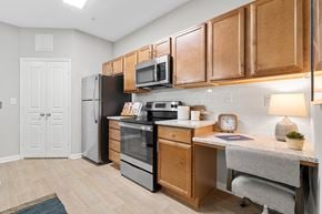Charlotte apartment for rent - our apartments offer a kitchen with stainless steel appliances and wooden cabinets