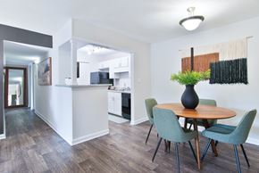 Huntsville apartment for rent - A dining room with a table and chairs.