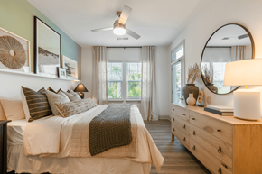 Little River townhouse for rent - a bedroom with a bed and a mirror