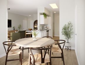 Durham apartment for rent - A modern dining room with a round table and chairs.