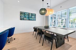 Palm Coast apartment for rent - A conference room with a long table and chairs.