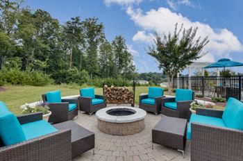 Outdoor wood-burning fire pit