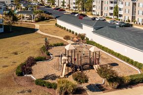Fayetteville apartment for rent - an aerial view of a playground in the middle of a park