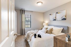 Madison apartment for rent - a bedroom with a large bed and a window