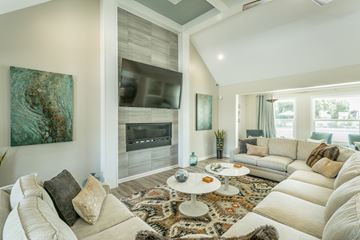 Huntsville apartment for rent - a living room with couches and a tv