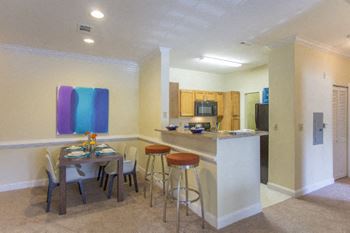 Gather around the breakfast bar in your kitchen at hawthorne at the meadows