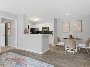 Athens apartment for rent - A kitchen with a dining table and chairs.