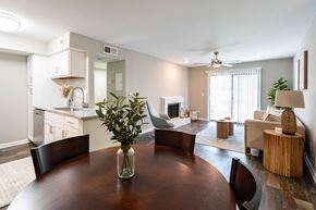 Charleston apartment for rent - A dining room with a wooden table and chairs.