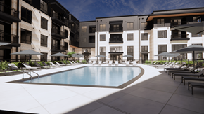 Greensboro apartment for rent - A swimming pool surrounded by lounge chairs and umbrellas in front of apartment buildings.