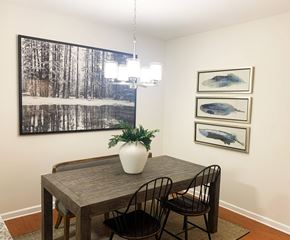 Soddy-Daisy apartment for rent - a dining room with a table and chairs