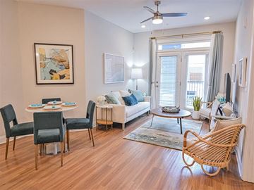 Oak Island apartment for rent - a living room with a couch and a table