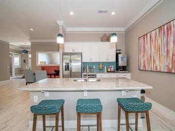 Wilmington apartment for rent - A kitchen with a white counter top and blue stools.