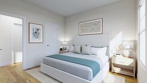 Calabash apartment for rent - a bedroom with a bed and a door to a closet