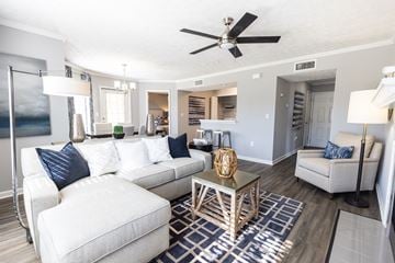 Montgomery apartment for rent - A living room with a white couch and a wooden coffee table.