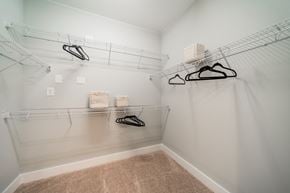 Apex apartment for rent - our spacious closets are stocked with shoes and bags in our spacious walk in closet