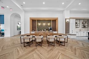 Cary apartment for rent - A dining room with a wooden table and chairs.