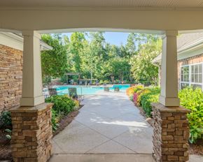 Columbia apartment for rent - A patio with a pool in the background.