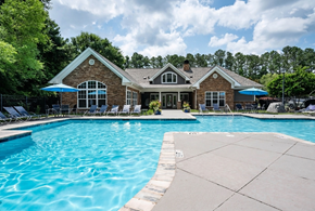 Columbia apartment for rent - A house with a pool in front of it.