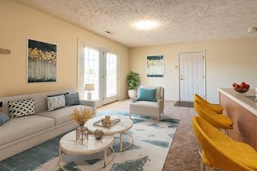 Hope Mills apartment for rent - a living room with a couch and chairs and a coffee table