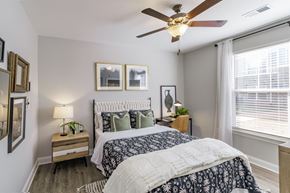 Hope Mills apartment for rent - large bedroom with blue and white bed