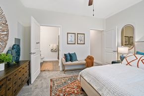 Little River apartment for rent - a bedroom with a bed and a dresser and a bathroom