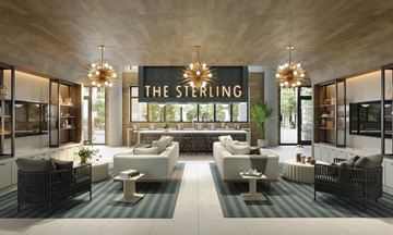Wilmington apartment for rent - A modern living room with a sign that says "The Sterling".