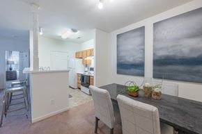 High Point apartment for rent - a kitchen and dining room with a table and chairs