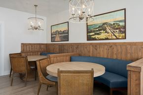 Wilmington apartment for rent - A dining area with a wooden table and chairs.
