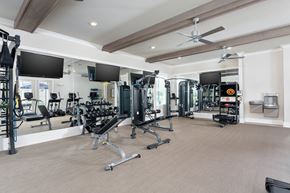 Wilmington townhouse for rent - A spacious gym with a variety of equipment.