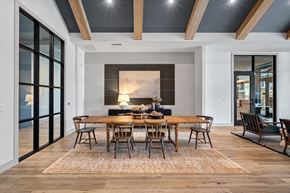 Candler apartment for rent - A modern dining room with a wooden table and chairs.