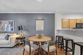 Greensboro apartment for rent - A dining room with a round table and chairs.