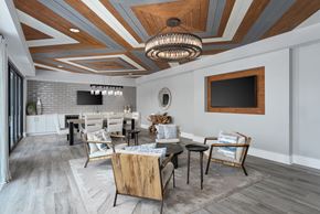 Wilmington apartment for rent - A modern dining room with a wooden table and chairs.