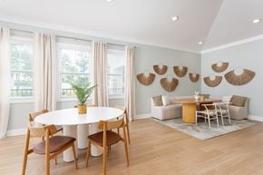 Leland apartment for rent - A dining room with a white table and chairs.