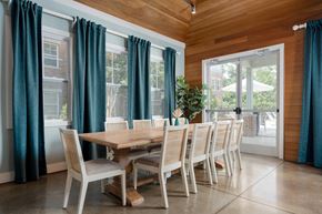 Wilmington apartment for rent - A dining room with a wooden table and chairs.