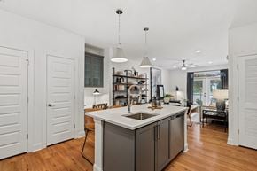 Holly Springs apartment for rent - A kitchen with a white counter and a sink.