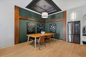 Holly Springs apartment for rent - A dining room with a wooden table and chairs.