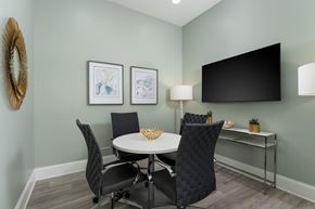 Wilmington apartment for rent - A dining room with a white table and chairs.