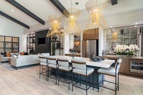 Greensboro apartment for rent - A modern dining room with a large table and chairs.