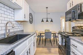 Greensboro apartment for rent - Upgraded kitchen and spacious dining space at Enclave at 38 Twenty Two Apartments in Greensboro, NC