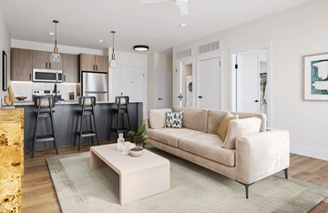 Huntsville apartment for rent - A modern living room with a beige sofa and a coffee table.